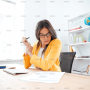 demo-attachment-449-businesswoman-analysing-document-P8WSNMC